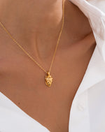 CADENA CORAZON ANATOMICO+ARETES AVEMARIA