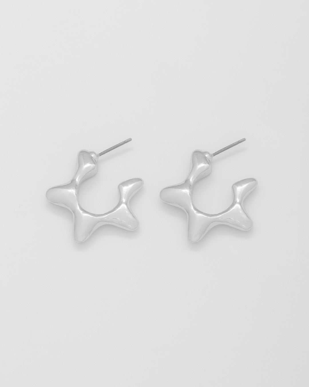 ARETES ESTRELLAS SILUETA PLATA AVEMARIA