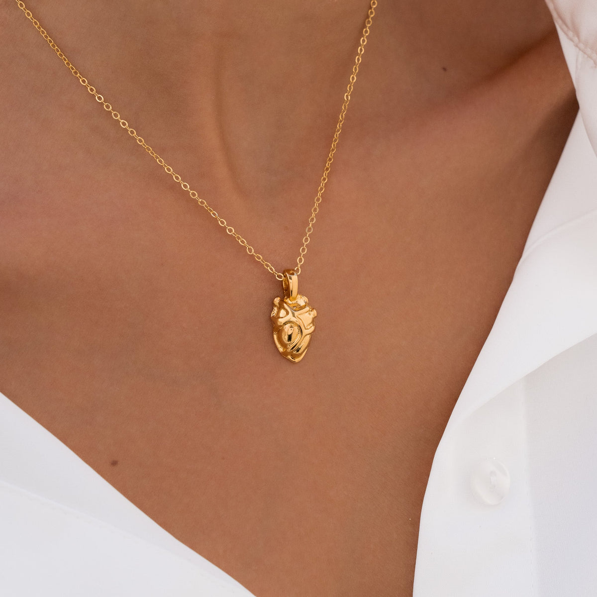 CADENA CORAZON ANATOMICO+ARETES AVEMARIA