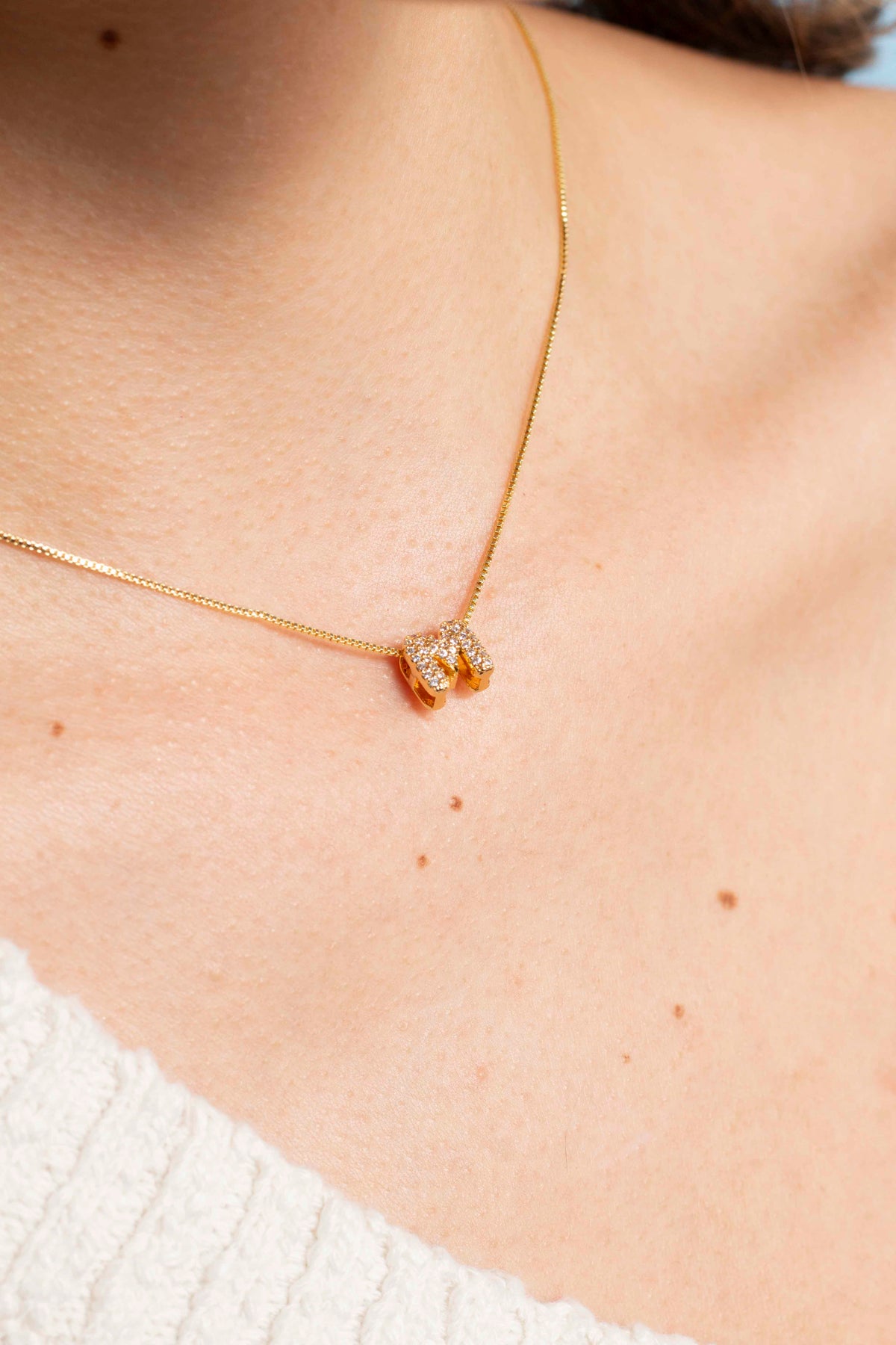 CADENA LETRA DORADA BRILLANTE 44CM RODIO MARTINA