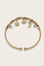 Pulsera Dije Mar Dorado Martina con fondo blanco humo cálido