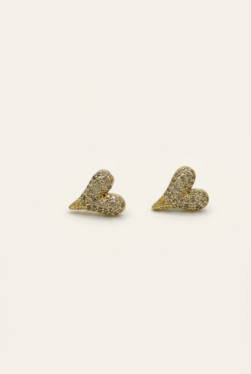 Topo Corazón Zircón Rodio Gold Martina con fondo blanco humo cálido