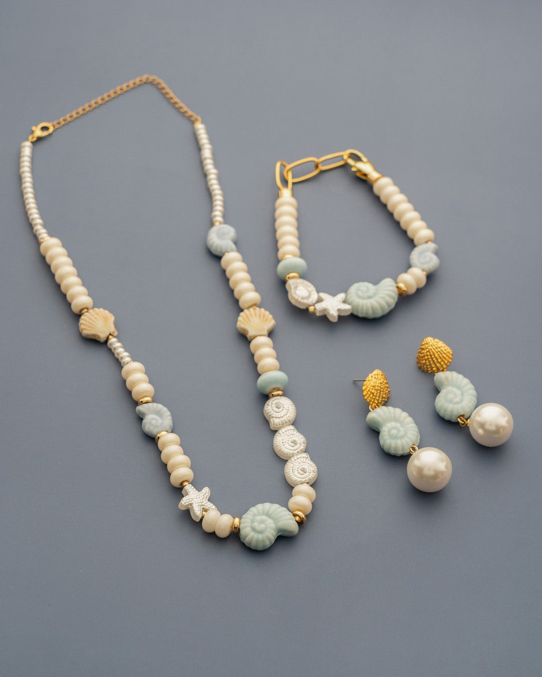 ARETES CARACOL PERLA AVEMARÍA