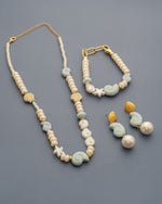 ARETES CARACOL PERLA AVEMARÍA