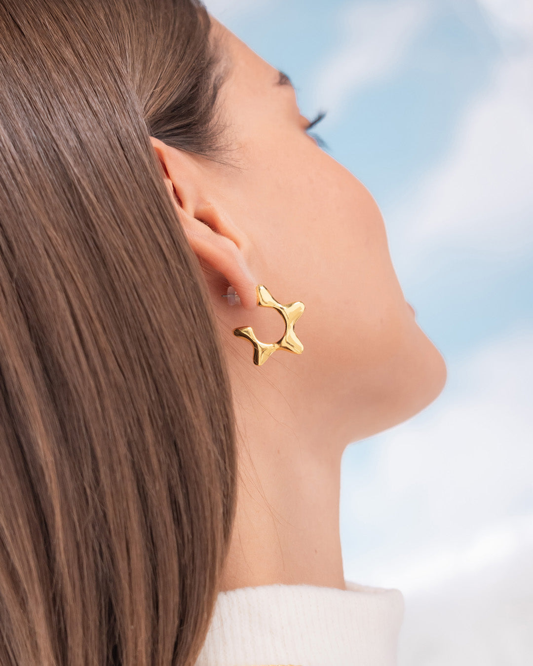 ARETES ESTRELLAS SILUETA ORO AVEMARIA