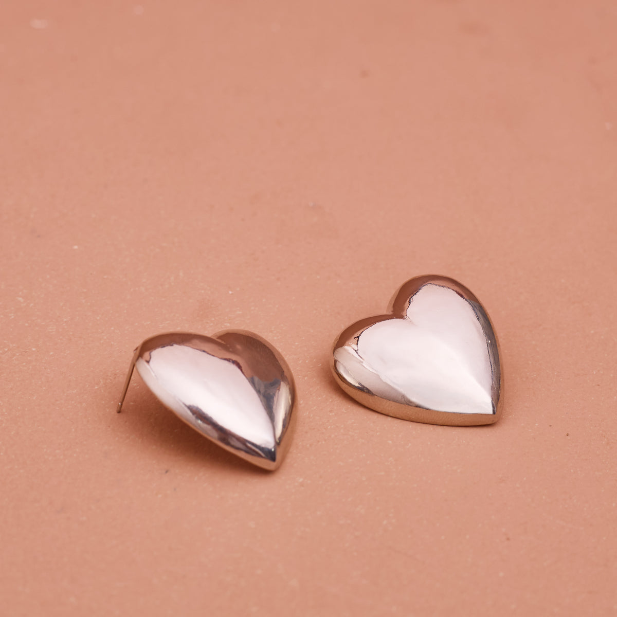 ARETES CORAZÓN XL PLATEADO RODIO MARTINA