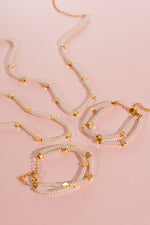 CHOKER PERLA CORAZON + ARETES AVEMARIA