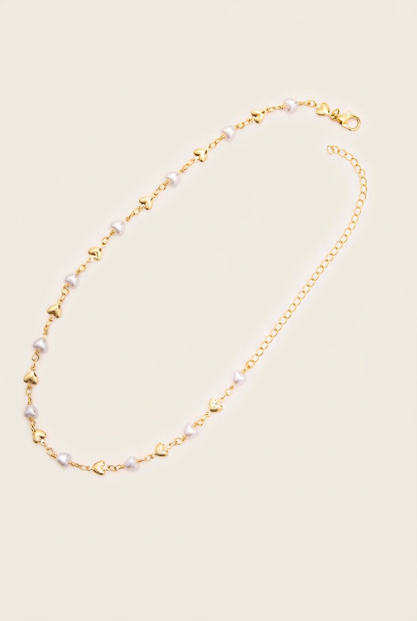 Collar Corazón Perla 30CM Rodio Martina con fondo blanco humo cálido